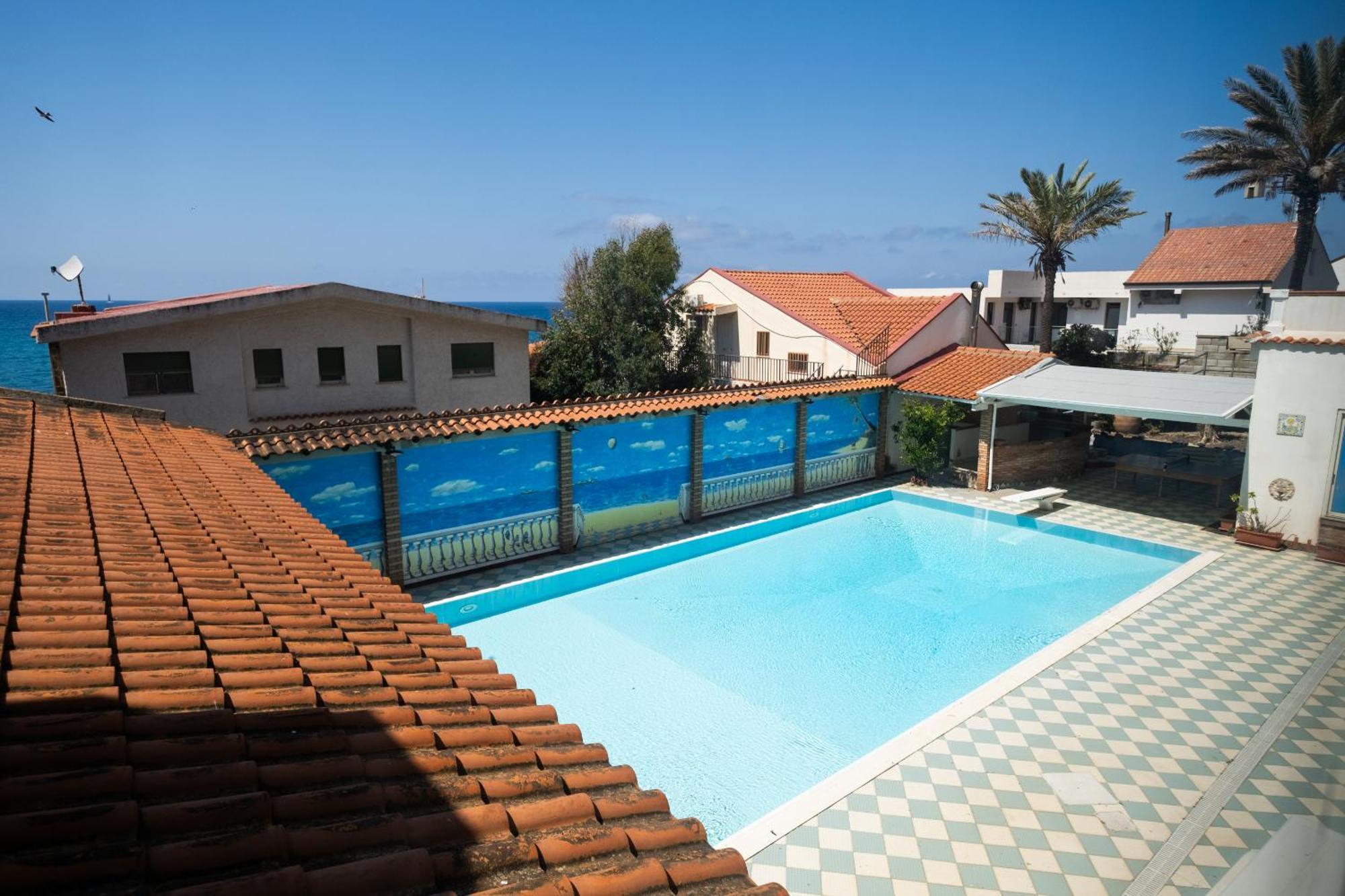 Oasi Azzurra Aparthotel เมสซีนา ภายนอก รูปภาพ